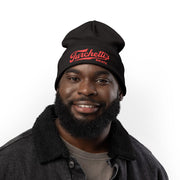 Man wearing the black Turchetti's knit beanie, side view