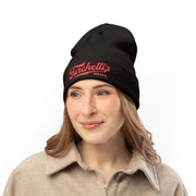 Woman wearing the black Turchetti's knit beanie